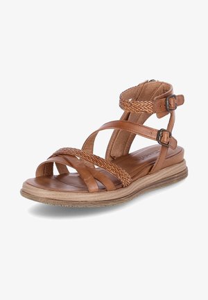 Hnědé kožené sandály se spletenými pásky, nastavitelnými sponami kolem kotníku, polstrovanou stélkou a strukturovanou podrážkou. Plná podešev.
