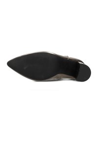 Pointed-toe shoe with a sleek brown leather upper, featuring a black textured rubber sole. Smooth texture with minimal detailing.