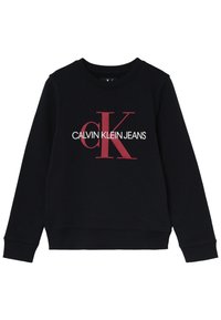 Sudadera negra de cuello redondo con el texto "CALVIN KLEIN JEANS" y un destacado logo rojo de "CK". Diseño simple y casual.