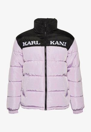 Purple puffer jacket with black upper panel, featuring white text "KARL KANI," zipper front, and elastic cuffs. Quilted texture.