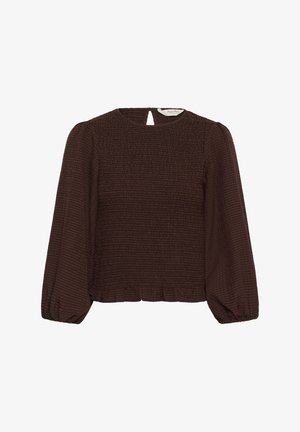 Brūna, ar smokiem apdrukāta blūze ar gariem pūstiem piedurknēm, apaļu kaklu un atslēgas caurumu muguras detaļā. Teksturēts svītrains audums ar kroku apakšmalu.