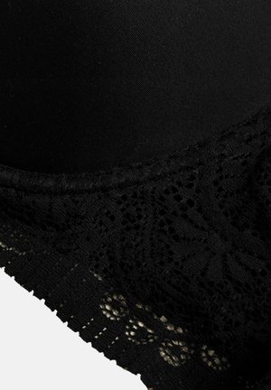 Black lingerie feature with a smooth upper fabric and intricate lace detailing along the bottom edge, showcasing a floral pattern.