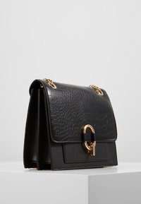 New Look Taška s příčným popruhem - black