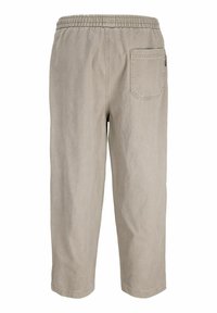 Μπεζ παντελόνι cropped με ελαστική μέση και μία πίσω τσέπη με πατζάκι στη δεξιά πλευρά.