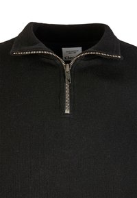 Black zip-up sweater with a short collar, ribbed texture, and silver zipper detail. Clean design, made from knit material.