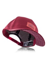 Maroon cap with a textured bill, mesh side panels, and a leather logo patch. Adjustable strap and printed inner lining design visible.