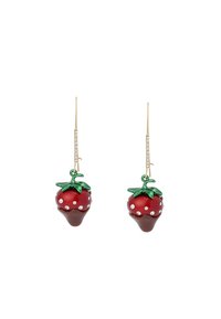 Gold dangle earrings with red strawberry charms featuring green leaves and small crystal accents along the hook and fruit.