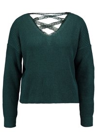 Pull vert en maille avec col en V et un dos en lacets croisés. Dispose de manches longues et d'une coupe texturée et ample.