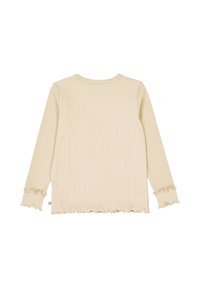 Maglietta a maniche lunghe di un beige chiaro in un tessuto a coste testurizzato. Presenta orli arricciati sulle maniche e sul fondo. Collo rotondo con una vestibilità comoda.