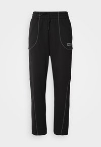 HUGO NIPIPEPANT - Tracksuit bottoms - black