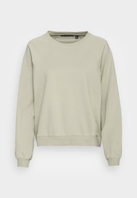 Maglione verde chiaro con scollatura a girocollo, maniche raglan e polsini e orlo a costine. Materiale morbido con una texture liscia.