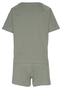 Short-sleeve, light green cotton leisure set featuring a round neck top and matching shorts, both with a smooth texture and simple design.