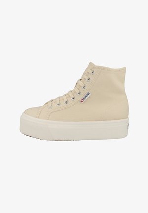 Sneaker alta beige in tela, con punta rotonda, design con lacci, suola in gomma bianca e logo Superga sul lato.
