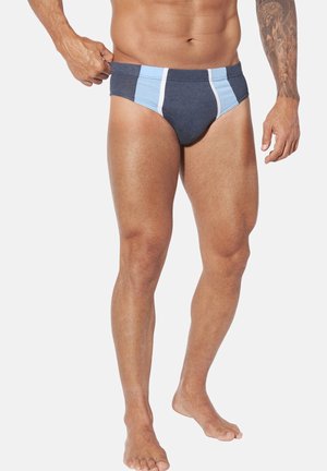Herren-Schwimmslips in Dunkelblau mit hellblauen und weißen Einsätzen. Glattes Material, enganliegendes Design und ein elastischer Taillenbund.