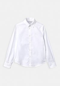 Vit långärmad skjorta i mjukt tyg, med spetsig krage, knäppning och subtil broderad logotyp på bröstet.