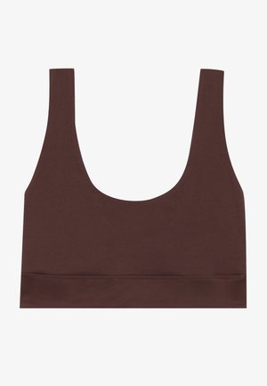 Brūna bezšuvju bralette ar platām siksnām, apaļo dekoltē un elastīgu apakšējo joslu. Izgatavota no gludas, elastīgas auduma.