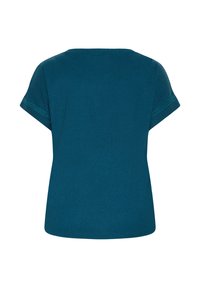 Haut en maille bleu à manches courtes avec un col rond et un détail discret de point texturé sur les poignets, vu de dos.