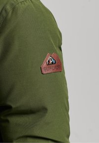 Superdry & Co Piumino lungo - khaki
