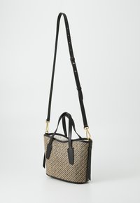 Black woven handbag with a textured finish, featuring dual top handles and a detachable shoulder strap. Gold hardware accents.