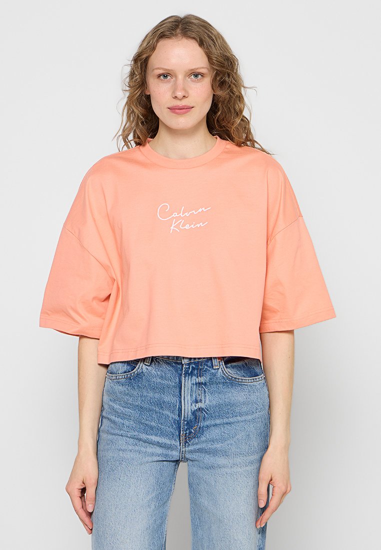Calvin Klein Jeans T-shirt print oranje Calvin Klein Jeans T-shirt print oranje