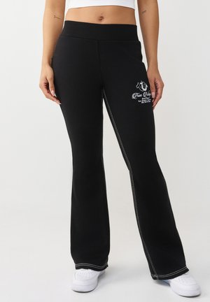 FLARE - Jogginghose - black