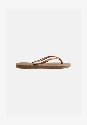 Brown rubber flip flop with textured sole and patterned, thin straps on a plain light gray background.