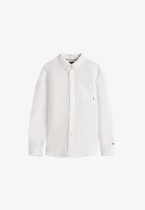 Camicia bianca a maniche lunghe in tessuto leggero, con colletto, chiusura a bottoni e taschino sul petto con una piccola etichetta con logo sulla manica.