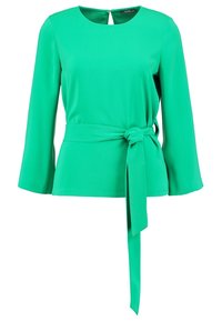 Blusa verde a maniche lunghe con scollo rotondo e vita cintrata. Realizzata in un tessuto morbido con un design semplice e senza motivi visibili.