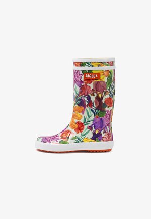 Witte rubberen regenlaars voor kinderen met een meerkleurig bloemenpatroon, witte zool en oranje "AIGLE" logo aan de voorkant.