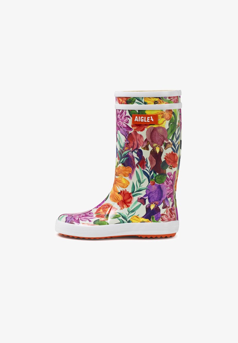 Biały gumowy kalosz dziecięcy z wielokolorowym kwiatowym wzorem, białą podeszwą i pomarańczowym logo "AIGLE" na przodzie.