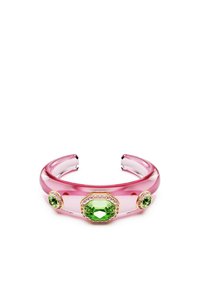 Translucent pink cuff bracelet featuring three green gemstones, accented by pink stones on a gold setting. Smooth, glossy finish.