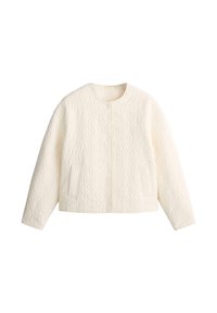 Veste matelassée couleur crème avec manches longues, col rond, boutons pression sur le devant et poches latérales, présentée sur fond blanc.