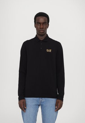 Black long-sleeve polo shirt made of cotton with a gold EA7 logo on the left chest, featuring a classic collar and button placket.