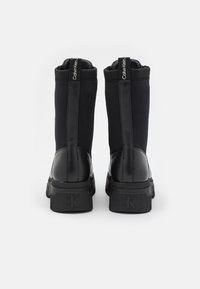 Calvin Klein Jeans CHUNKY COMBAT LACEUP ZIP - Botines con plataforma - black