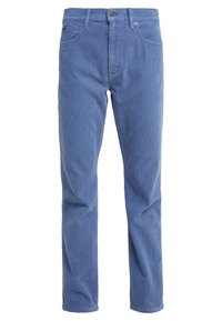 Pantalon en velours côtelé bleu avec fermeture à boutons, passants pour ceinture et poches avant, présenté sur un fond blanc.