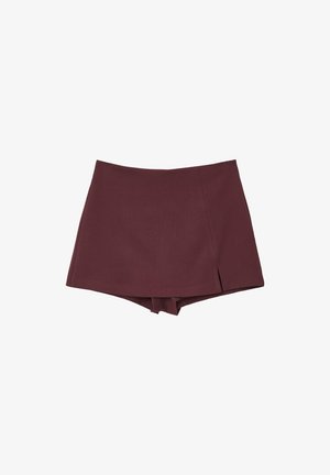 Bordeauxfarbener Rock mit strukturiertem Design und einem Schlitz vorne. Hergestellt aus strukturiertem Stoff, zeichnet er sich durch einen sauberen Schnitt und keine sichtbaren Nähte aus.