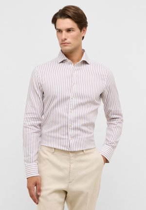 Striped button-up shirt in light beige and white, long sleeves, slim fit; fabric appears lightweight with a smooth texture.