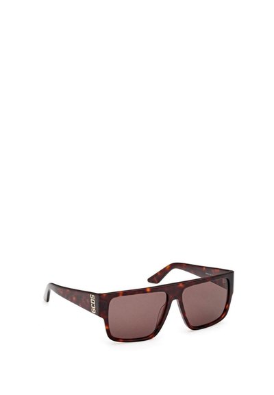 Gafas de sol rectangulares carey con lentes oscuros y logo de GCDS en dorado en la patilla izquierda.