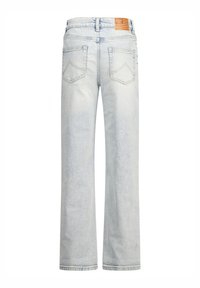 Vaaleansiniset farkut, joissa on leveät lahkeet ja keski-korkea vyötärö. Takana on kaksi taskua, joissa on ommeltuja yksityiskohtia, sekä logo-merkki takavyötäröllä.