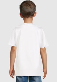 White cotton t-shirt with short sleeves, round neckline, and a standard fit, displayed from the back.