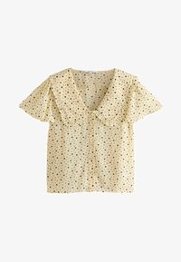 Vybráno, yellow ditsy spot