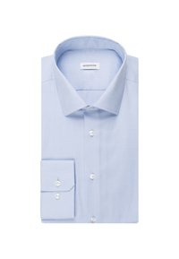 Chemise habillée pour homme de couleur bleu clair avec col ouvert et poignets boutonnés, soigneusement pliée avec l'étiquette de la marque visible à l'intérieur du col.
