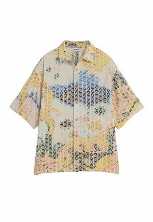 Chemise à manches courtes avec boutons, motif abstrait multicolore en tons pastel jaune, bleu, rose et noir sur fond clair.