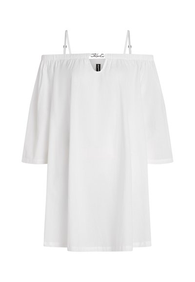 Robe blanche décolletée avec des manches courtes, fabriquée en tissu léger. Elle présente un col rond et un design ample et fluide.