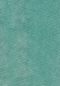 Turkos texturerat tyg med ett ribbat mönster, som visar jämn sömnad och en mjuk, matt finish.