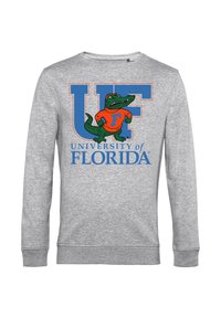 Szary sweatshirt z dużym logo "UF" oraz postacią zielonego aligatora w pomarańczowej koszulce, z napisem "University of Florida" poniżej.