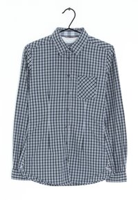 Chemise à boutons avec un motif à carreaux noir et blanc, manches longues, col et une poche poitrine. Fabriquée en tissu léger.