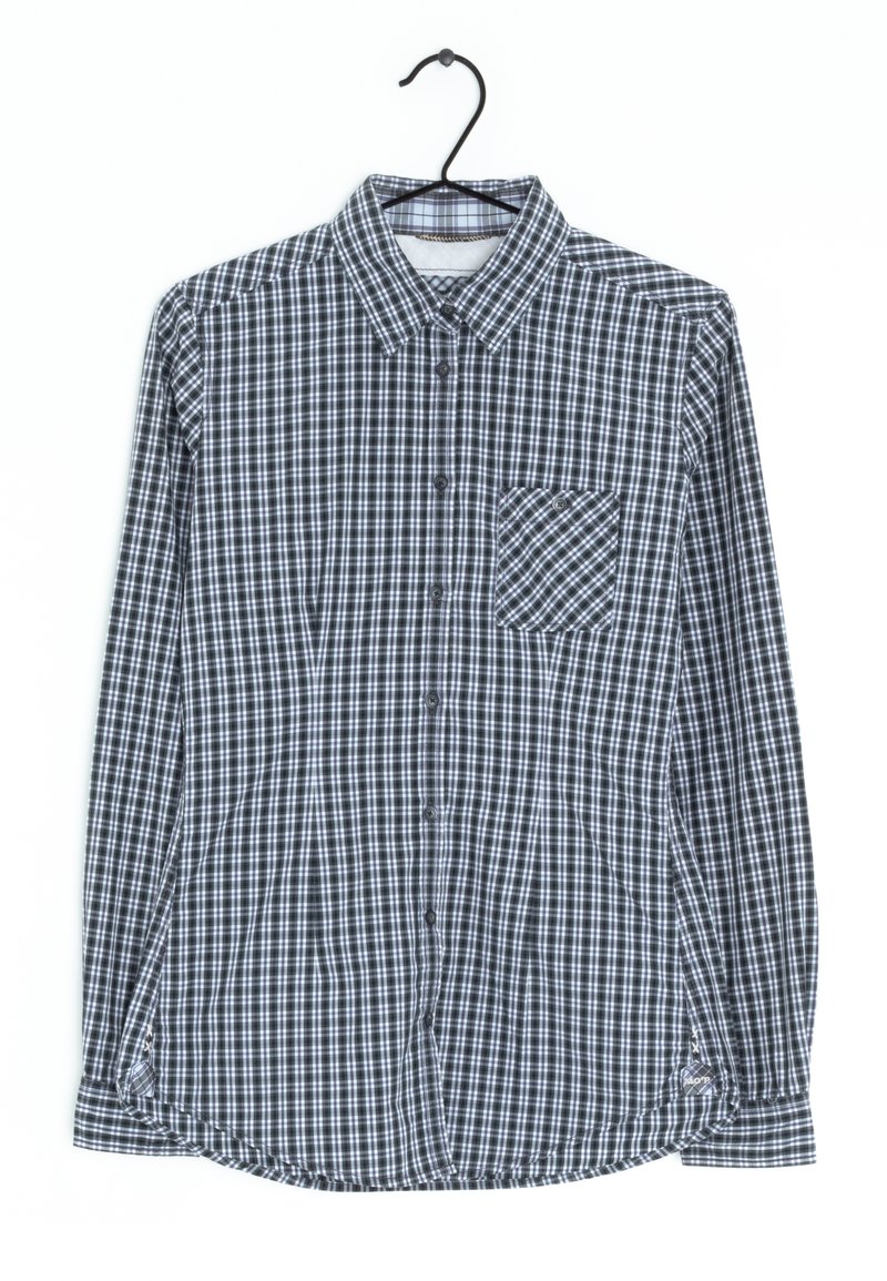 Chemise à boutons avec un motif à carreaux noir et blanc, manches longues, col et une poche poitrine. Fabriquée en tissu léger.