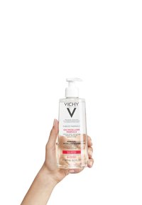 Clear plastic bottle of Vichy Mineral Micellar Water, 400 ml, with a white pump cap; label features text in pink and black on a transparent background.
