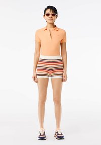 Lacoste Piké - orange clair ixy